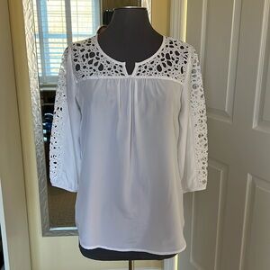 White cut-out ladies blouse